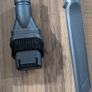 Dyson V6 handheld vacuum cleaner with charger and accessories Image 4