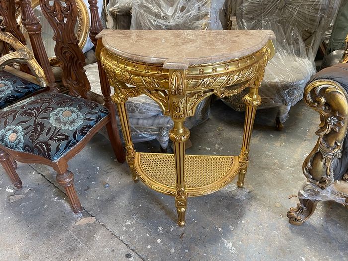 Carved wood gilt console table