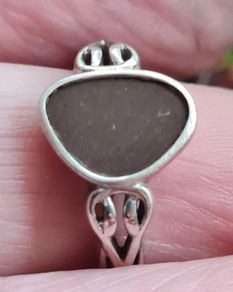 Vintage 925 sterling silver ring with a brown stone.