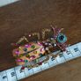 Beautiful brooch in the form of a large beetle with enamel and rhinestones. Image 2
