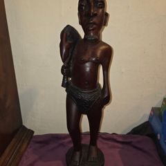 Large carved wooden African Man Statue