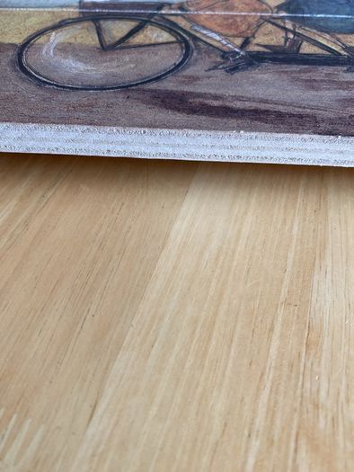 Picture titled 'A nice day for it'- on timber.