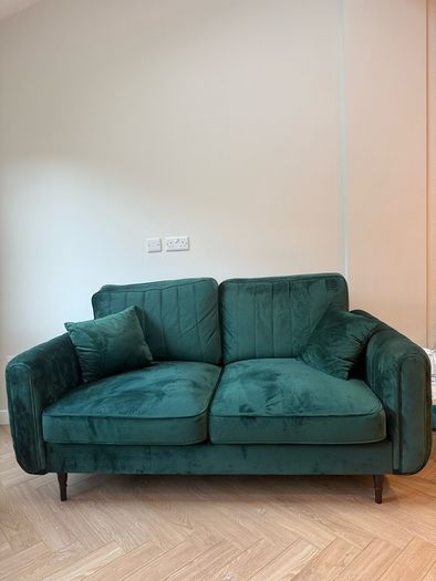 Green velvet sofa