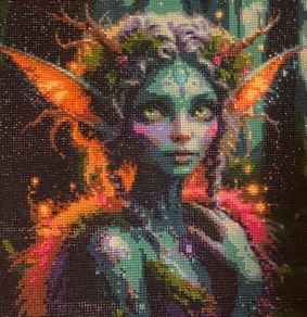 Hand crafted gem art green fairy in forest