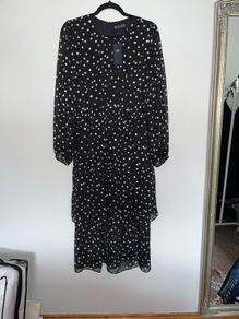 Dress, brand new with tags, long sleeves, elasticised waist tiered skirt, black with silver polka dots, very elegant