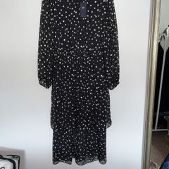 Dress, brand new with tags, long sleeves, elasticised waist tiered skirt, black with silver polka dots, very elegant