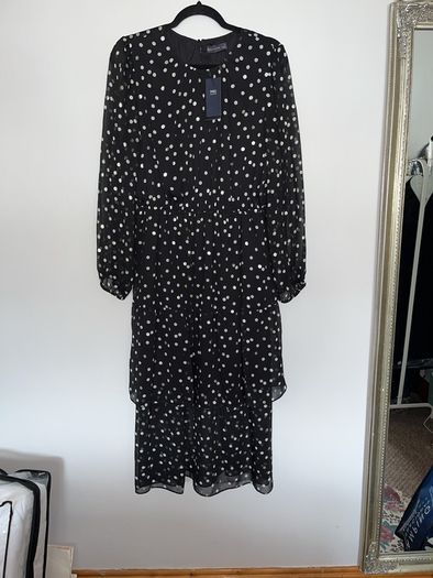 Dress, brand new with tags, long sleeves, elasticised waist tiered skirt, black with silver polka dots, very elegant