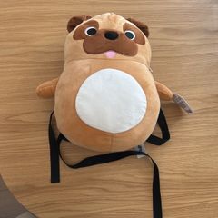 Dog squished backpack