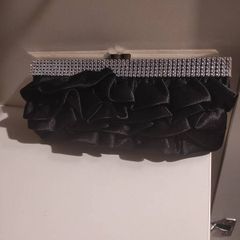 Black ruffle clutch with silver chain