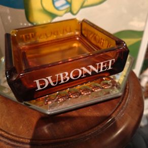 Vintage Dubonnet heavy amber glass advertising ashtray
