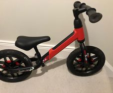 Spark red balance bike