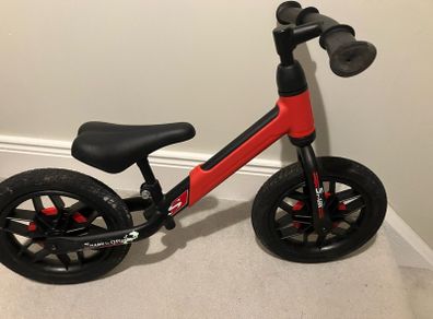 Spark red balance bike
