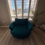 Teal love seat swivel. Image 3
