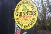 Guinness  2 sided cast iron sign