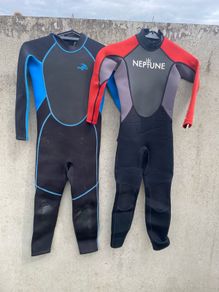 2 kids wetsuits grow from 1 into the other