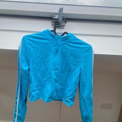 Zipped up blue top