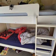 White bunk beds with ladder