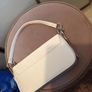 Brand new satin cream occassion bag Image 4