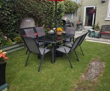 garden table and chairs with parasol