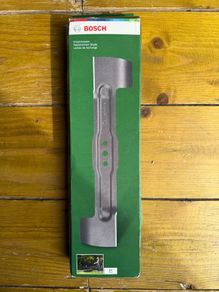 Replacement lawnmower blade