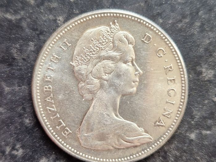 Two Canadian Silver Dollars 1867-1967
