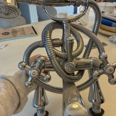 Telephone style bath/shower mixer tap