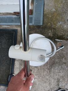 Triton Mira Shower head and wall arm.