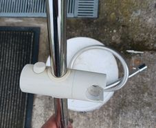 Triton Mira Shower head and wall arm.