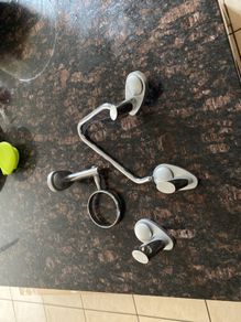 Towel hanger, bracket for toothbrush glass and brackets for towel rail.