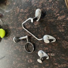 Towel hanger, bracket for toothbrush glass and brackets for towel rail.