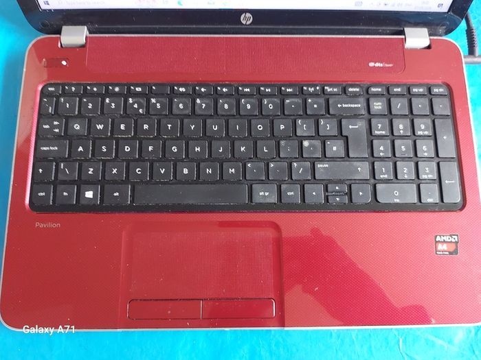 HP Pavillion, Red, AMD A4-5000 APU wiyj Radeo HD Graphics, 1.5GHz,  4GB Ram, 700GB HDD, Windows 10, Microsoft Edge, Chrome