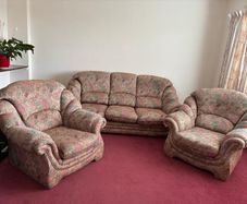 Three piece floral sofa suite