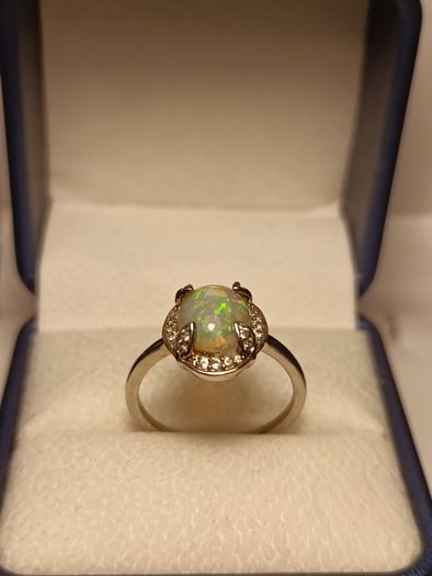 Ethiopian Welo Opal and Lab Grown Diamond Oval Cluster Ring.
