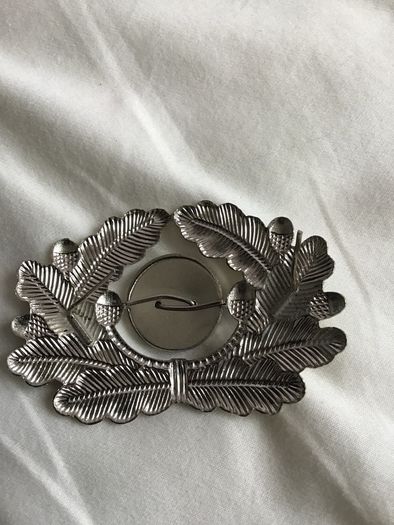 Military memorabilia from a State that no longer exists -  East German Military hat badge