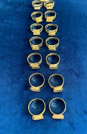 Set of 14 gold tone adjustable rings