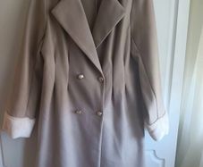 Double breasted Coat in a neutral beige and faux fur.