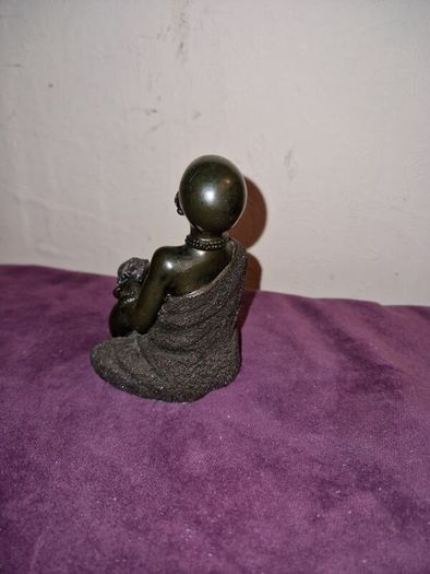 African child with water jug statue