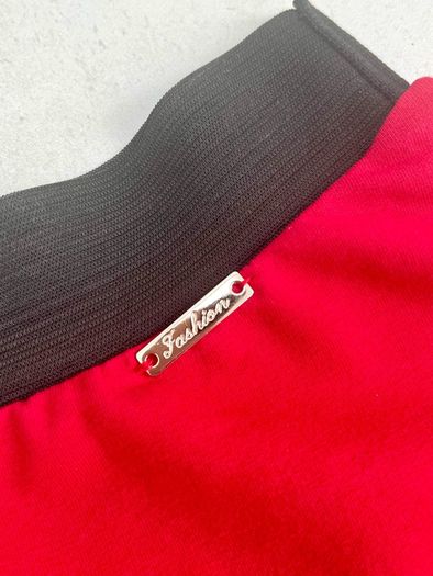 Girls skirt red with black elastic waist band