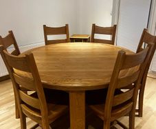 solid oak dining table and 6 chairs