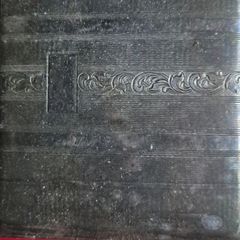 vintage art deco era engraved metal pocket cigarette case.