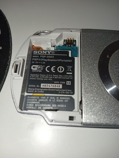 Sony Silver PSP 2003 Console - Works with Digital Games but wont load UMD Disks 16gb sd inc