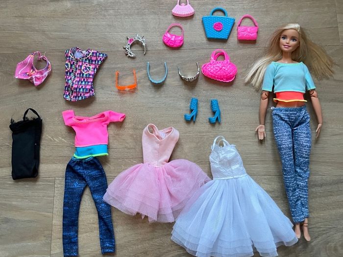 barbie with clothes and accessories