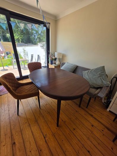 Elegant Mid-Century Modern Extendable Dining Table