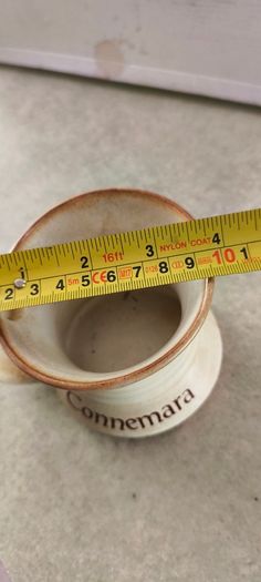 Connemara Pottery Irish stoneware mug with a cream glaze and brown rim