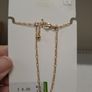 Golden necklace with charms Image 3