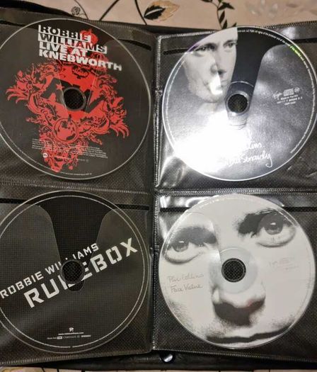 80 CD + Case. All CD's in perfect playable condition.
