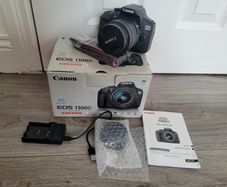 Canon EOS 1300D DSLR in box with lens