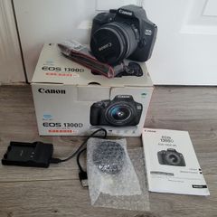 Canon EOS 1300D DSLR in box with lens