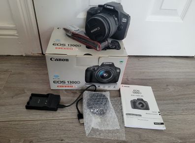 Canon EOS 1300D DSLR in box with lens