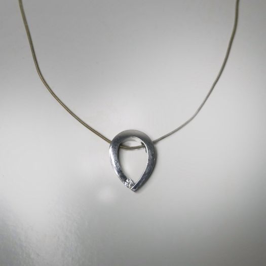 Silver necklace with a cz stone